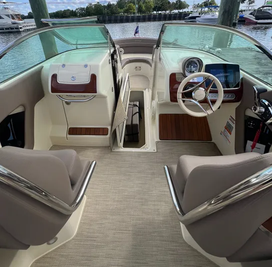  Yacht Photos Pics 2023 Chris-Craft Launch 28 GT interior with modern dashboard and seating.