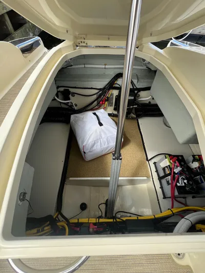  Yacht Photos Pics 2023 Chris-Craft Launch 28 GT engine compartment with storage and wiring.