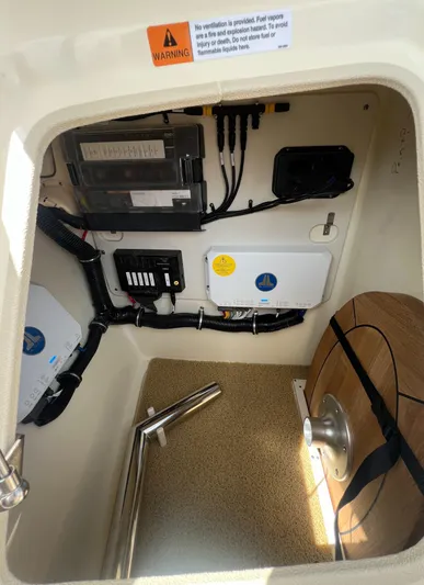  Yacht Photos Pics Interior view of 2023 Chris-Craft Launch 28 GT boat's electrical compartment.