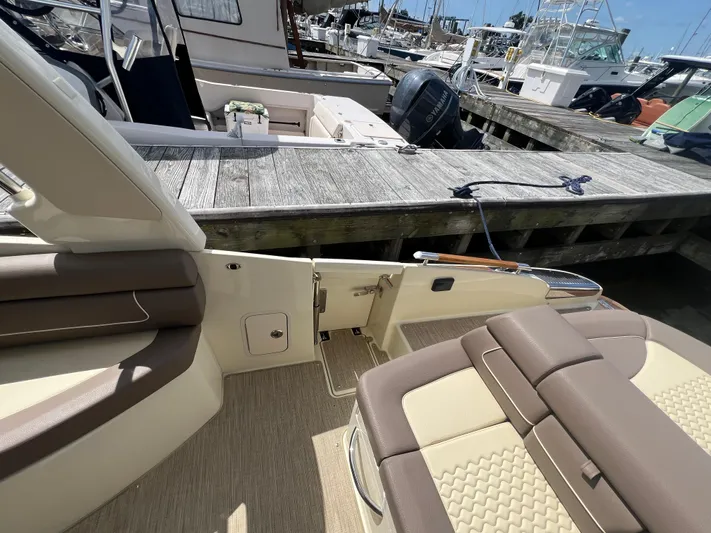  Yacht Photos Pics 2023 Chris-Craft Launch 28 GT interior, docked at marina.