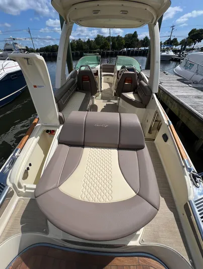  Yacht Photos Pics 2023 Chris-Craft Launch 28 GT boat interior with luxurious seating and elegant design.