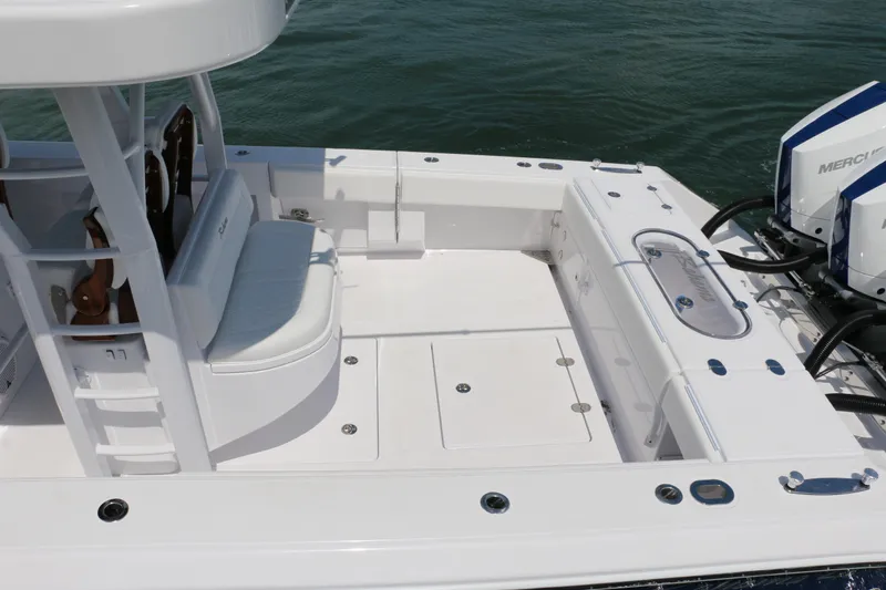  Yacht Photos Pics 2026 Bahama 41 GT boat deck with seating and dual Mercury engines.