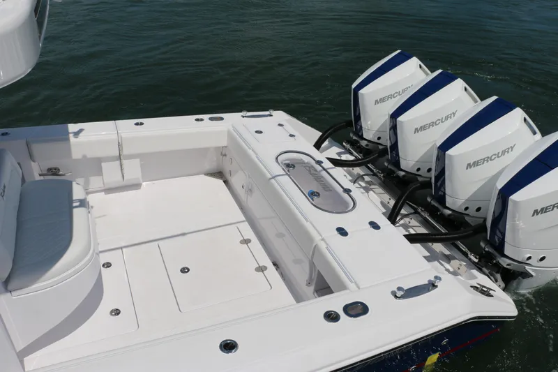  Yacht Photos Pics 2026 Bahama 41 GT boat with four Mercury outboard engines on water.