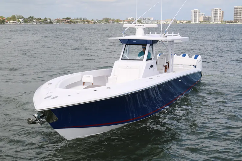  Yacht Photos Pics 2026 Bahama 41 GT boat cruising on water, featuring sleek design and modern technology.