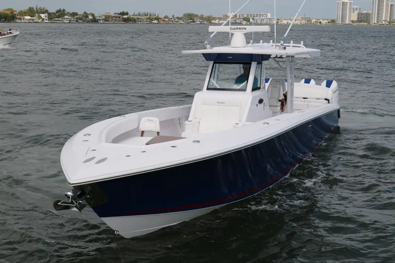  Yacht Photos Pics 2026 Bahama 41 GT boat cruising on open water, showcasing sleek design and modern features.