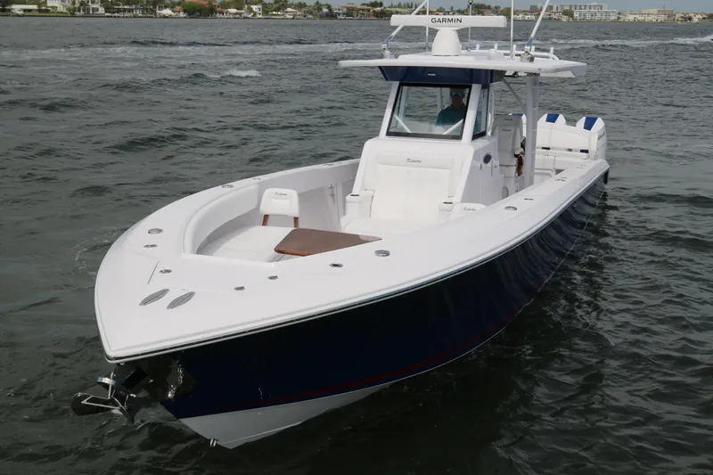  Yacht Photos Pics 2026 Bahama 41 GT boat cruising on open water, featuring sleek design and modern amenities.