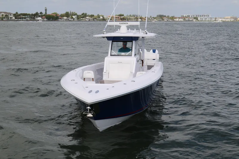  Yacht Photos Pics 2026 Bahama 41 GT boat on water, featuring sleek design and advanced navigation equipment.