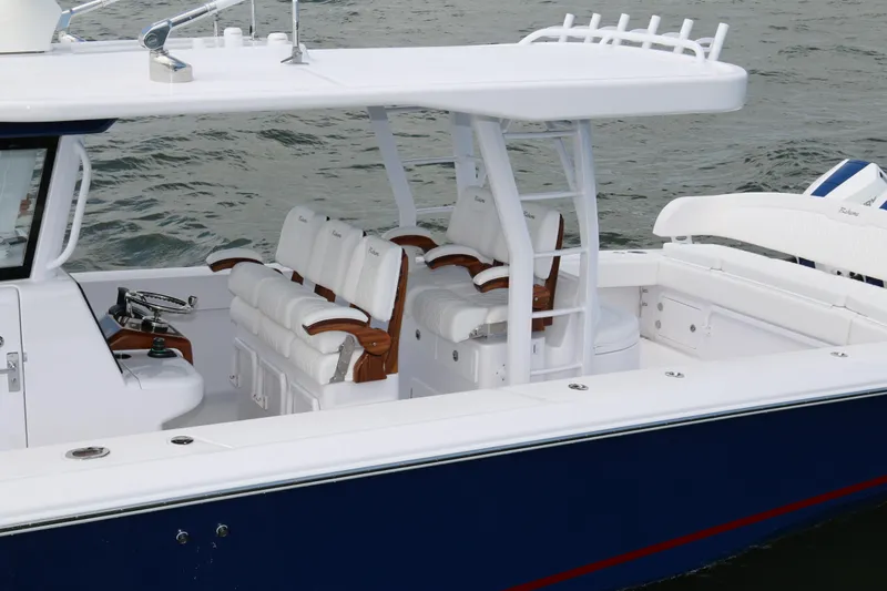  Yacht Photos Pics 2026 Bahama 41 GT boat with luxurious seating and sleek design on the water.