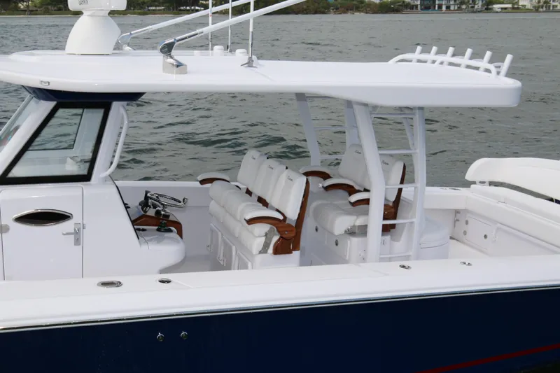  Yacht Photos Pics 2026 Bahama 41 GT boat with sleek design and luxurious seating on the water.