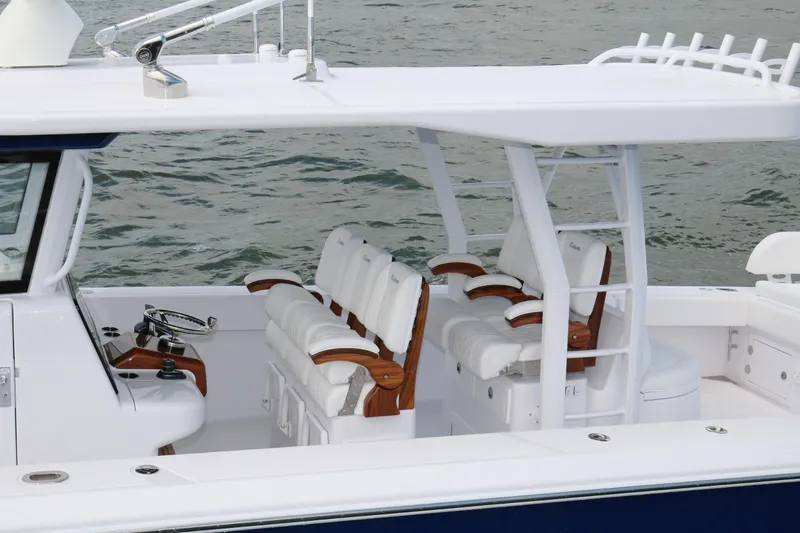  Yacht Photos Pics 2026 Bahama 41 GT boat with luxurious seating and sleek design on the water.