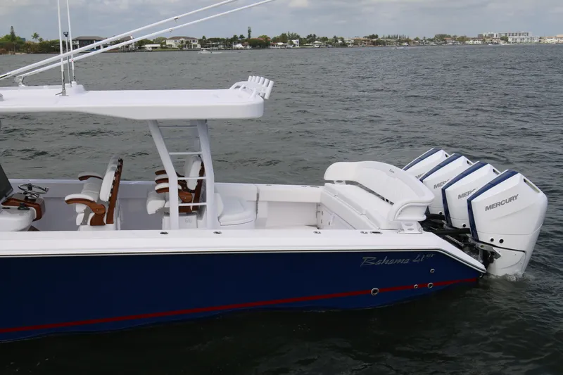  Yacht Photos Pics 2026 Bahama 41 GT boat with triple Mercury engines on open water.