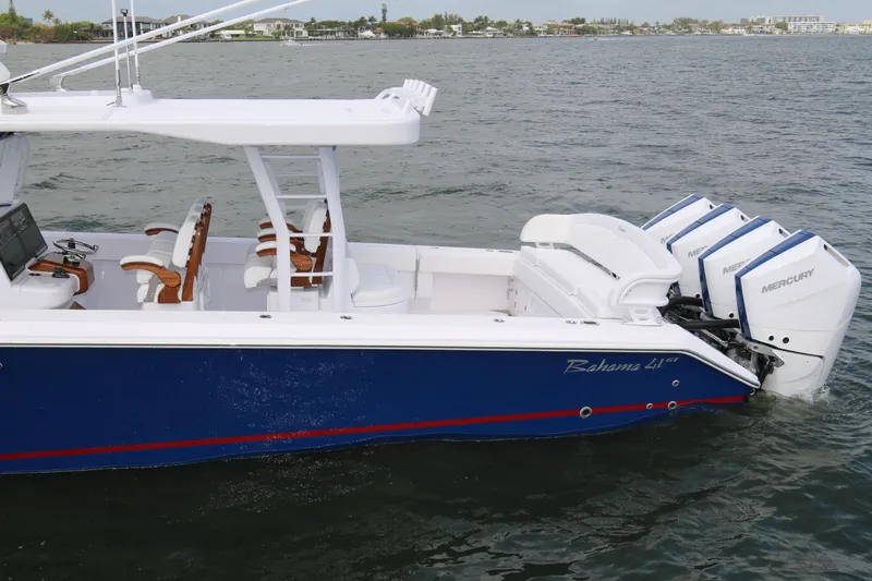  Yacht Photos Pics 2026 Bahama 41 GT boat with triple Mercury engines on the water.
