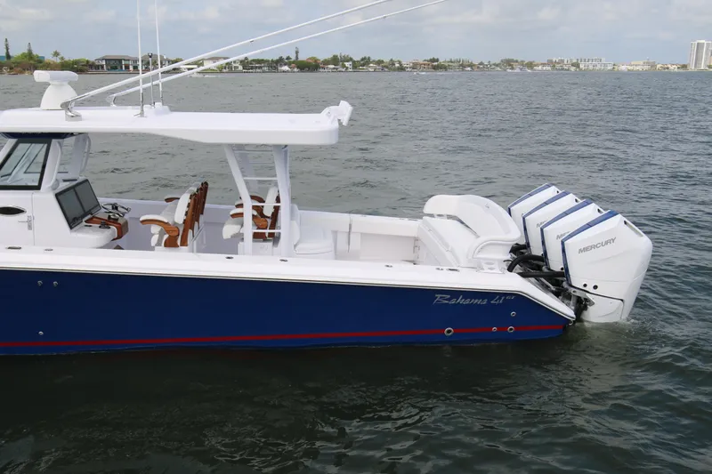  Yacht Photos Pics 2026 Bahama 41 GT boat with triple Mercury engines on the water.