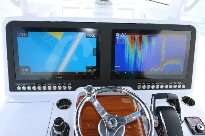  Yacht Photos Pics Dashboard of 2026 Bahama 41 GT with dual Garmin navigation screens.