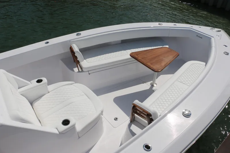  Yacht Photos Pics Luxurious seating area on 2026 Bahama 41 GT boat with elegant wood table.