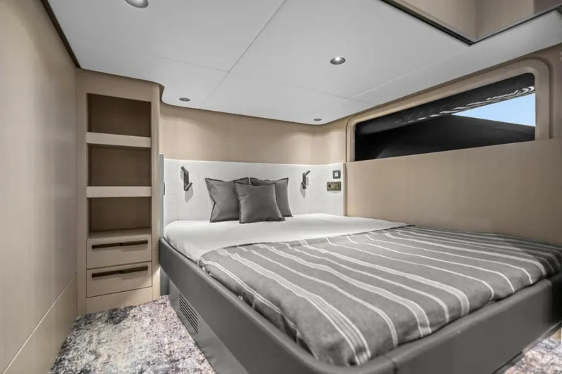  Yacht Photos Pics Luxurious bedroom interior of 2027 Canados Gladiator 571 Blade yacht, featuring modern design.