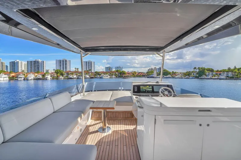 Rani Yacht Photos Pics Luxurious Sunseeker Manhattan 68 Pacific yacht interior, 2023 model, with waterfront cityscape view.