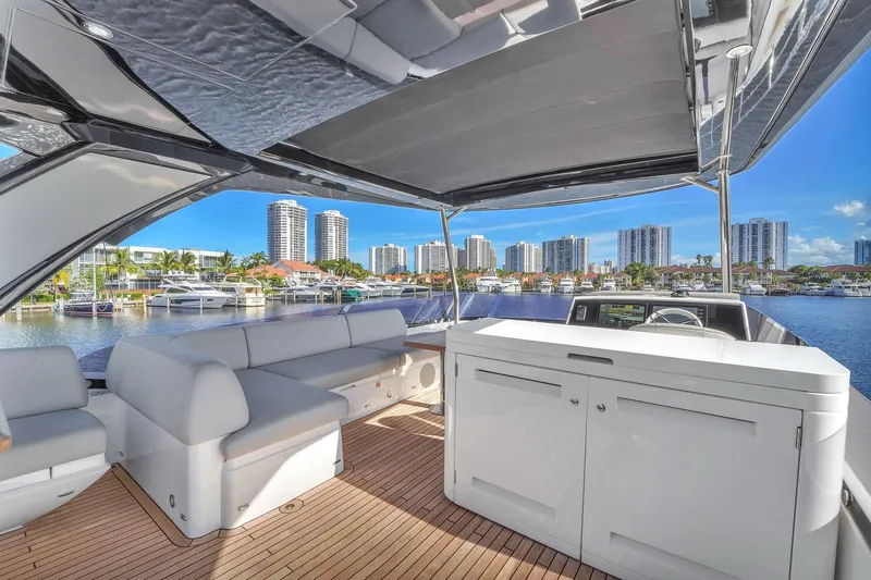 Rani Yacht Photos Pics Luxurious 2023 Sunseeker Manhattan 68 Pacific yacht interior with waterfront cityscape view.