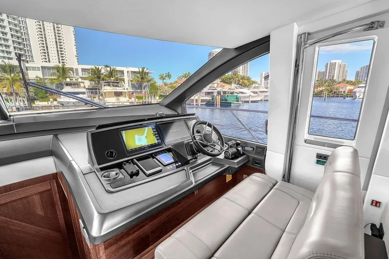 Rani Yacht Photos Pics 2023 Sunseeker Manhattan 68 Pacific yacht helm with modern navigation system.