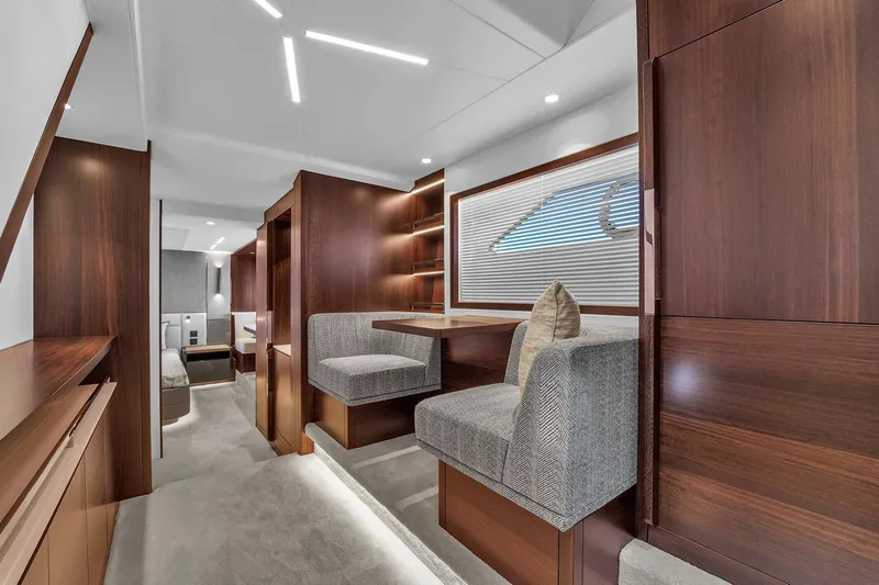 Rani Yacht Photos Pics Luxurious interior of 2023 Sunseeker Manhattan 68 Pacific yacht with elegant wood finishes.