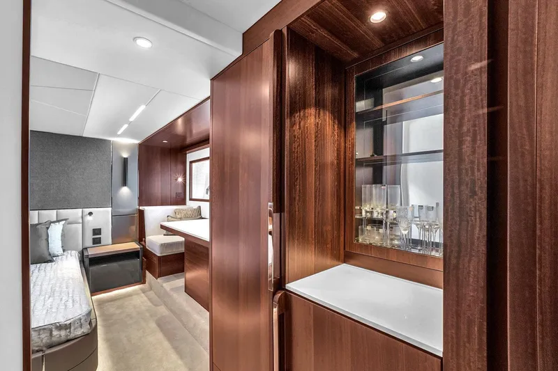 Rani Yacht Photos Pics Luxurious interior of 2023 Sunseeker Manhattan 68 Pacific yacht with elegant wood finishes.