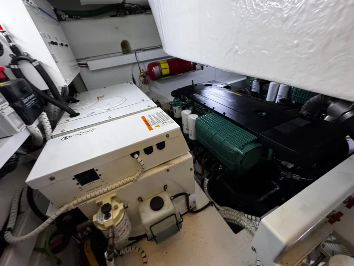  Yacht Photos Pics Engine room of 2018 Fairline Targa 48 Open yacht, featuring mechanical components and equipment.