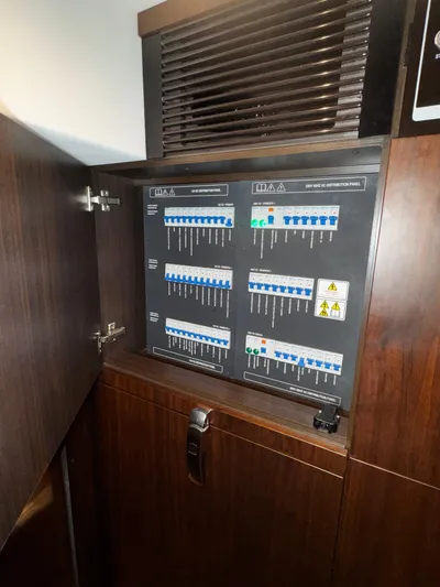  Yacht Photos Pics Electrical panel inside 2018 Fairline Targa 48 Open yacht, featuring circuit breakers and switches.