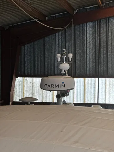  Yacht Photos Pics 2018 Fairline Targa 48 Open with Garmin radar in a covered storage area.