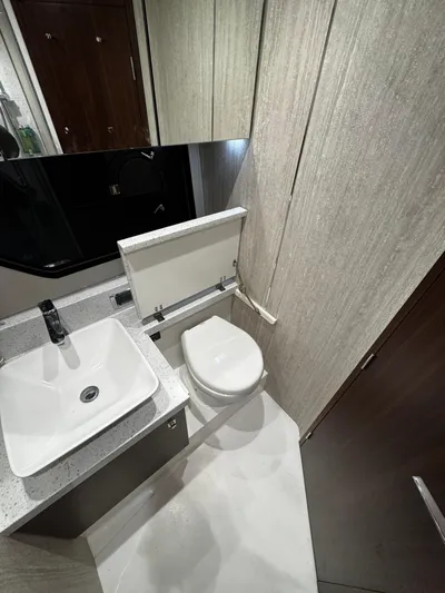  Yacht Photos Pics 2018 Fairline Targa 48 Open bathroom with modern sink and toilet.