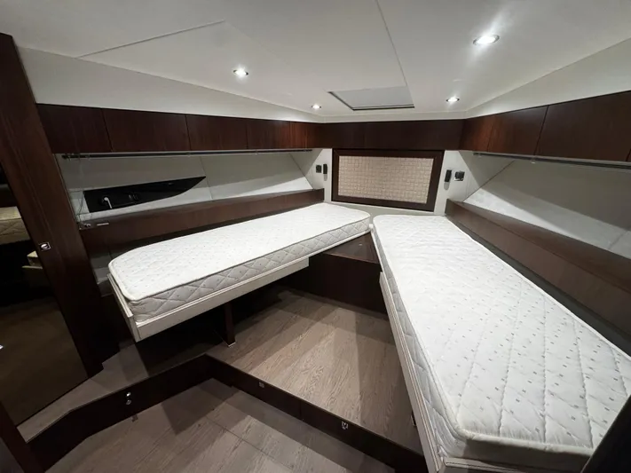  Yacht Photos Pics Cabin interior of 2018 Fairline Targa 48 Open with twin beds and modern design.