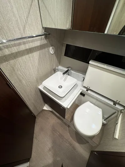  Yacht Photos Pics Modern bathroom in 2018 Fairline Targa 48 Open yacht with sink and toilet.