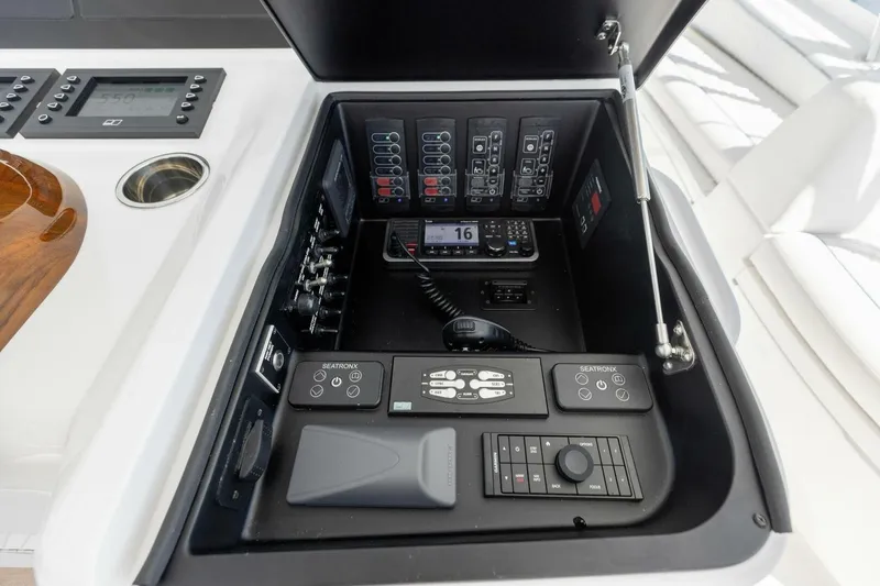 Team Harvey Yacht Photos Pics Control panel of 2026 Viking 82 Convertible yacht, featuring advanced navigation and communication systems.
