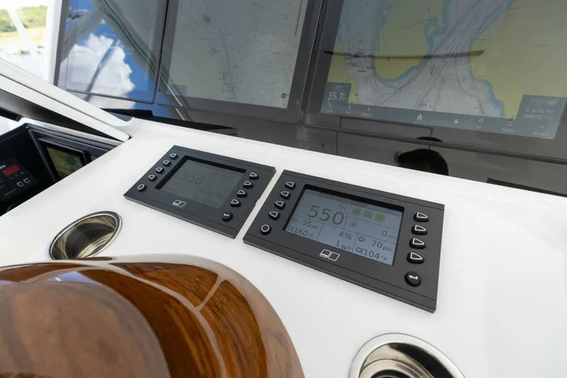 Team Harvey Yacht Photos Pics 2026 Viking 82 Convertible yacht dashboard with navigation and control displays.