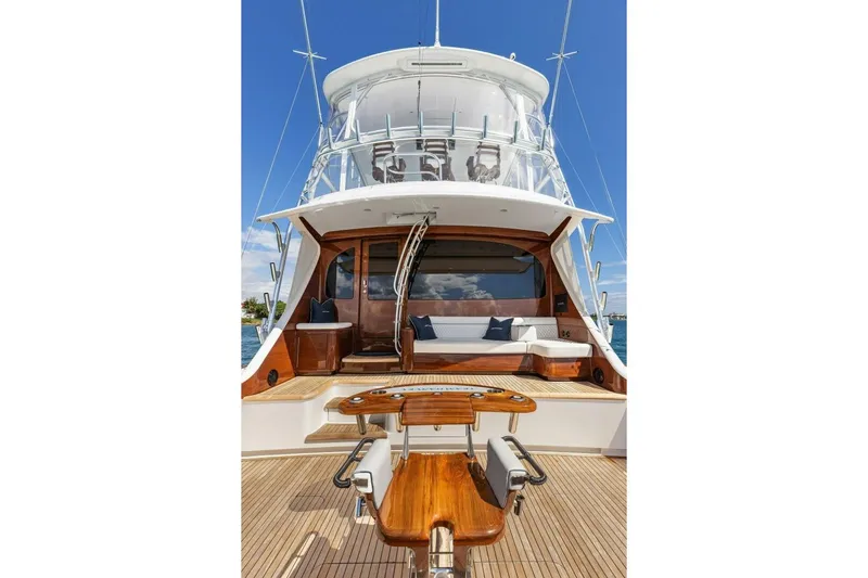 Team Harvey Yacht Photos Pics 2026 Viking 82 Convertible yacht with elegant deck and seating area.