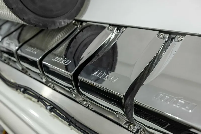 Team Harvey Yacht Photos Pics Close-up of MTU engine components on a 2026 Viking 82 Convertible yacht.