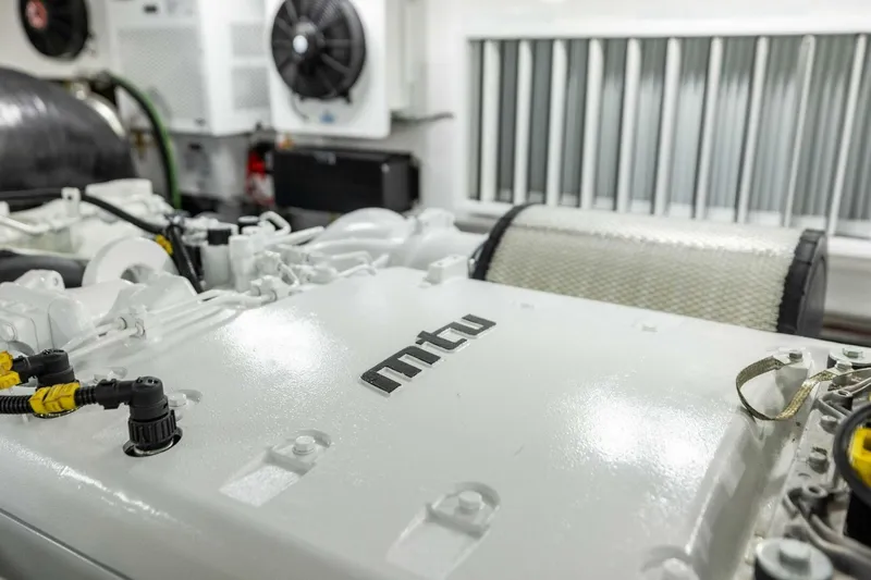 Team Harvey Yacht Photos Pics Engine room of 2026 Viking 82 Convertible yacht with MTU engine.
