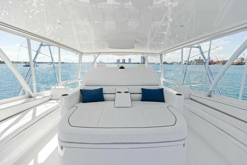 Team Harvey Yacht Photos Pics Luxurious interior of 2026 Viking 82 Convertible yacht with ocean view.