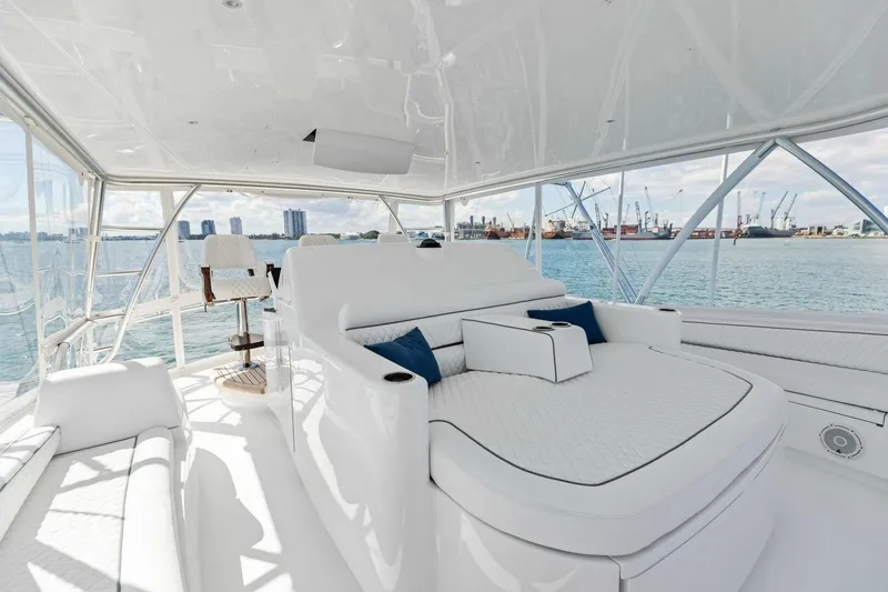 Team Harvey Yacht Photos Pics Luxurious interior of 2026 Viking 82 Convertible yacht with ocean view.