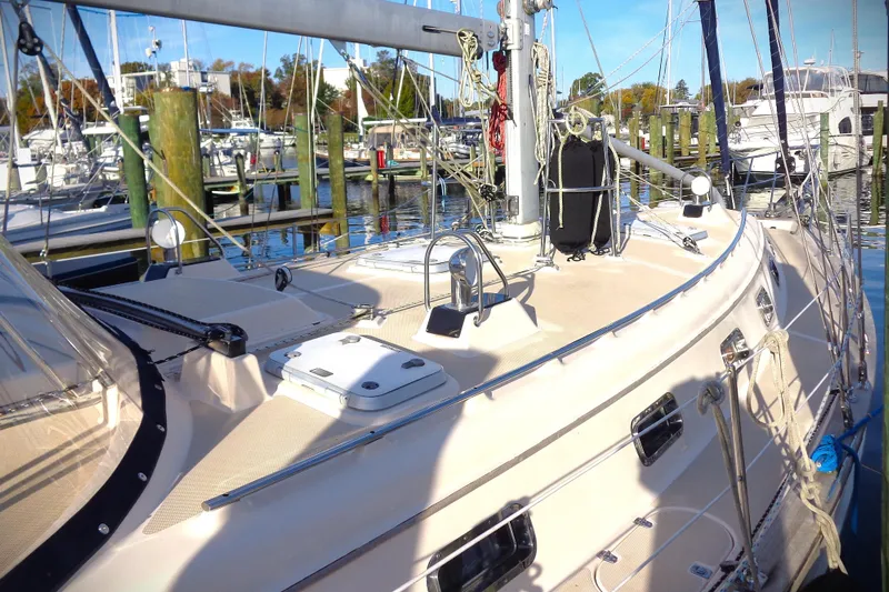 Epithelios Yacht Photos Pics 2002 Island Packet 420 sailboat docked at marina, showcasing deck and rigging.