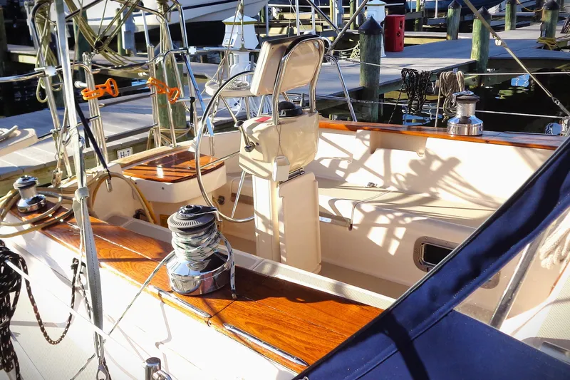 Epithelios Yacht Photos Pics Cockpit of 2002 Island Packet 420 sailboat with polished wood and nautical equipment.