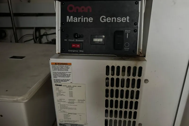  Yacht Photos Pics Onan Marine Genset in 2006 Cruisers Yachts 560 Express engine room.