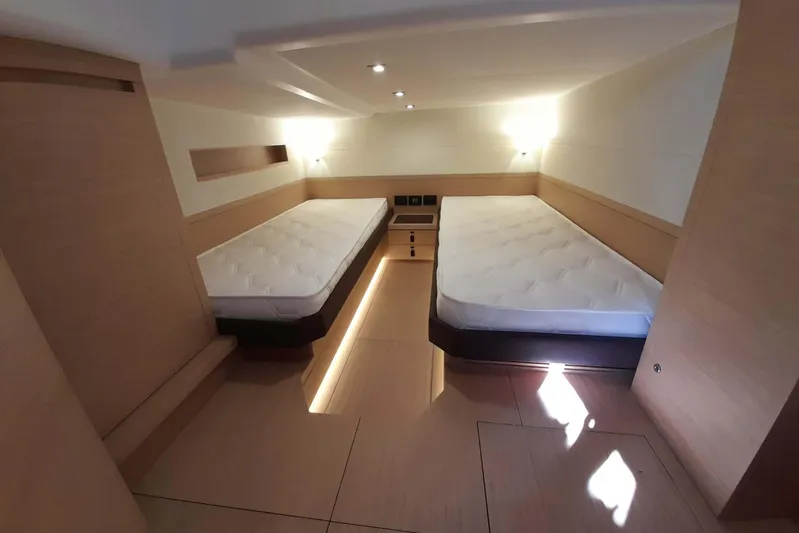Ban Ban Yacht Photos Pics Luxurious cabin interior of 2023 Pardo Yachts P50 with twin beds and modern lighting.
