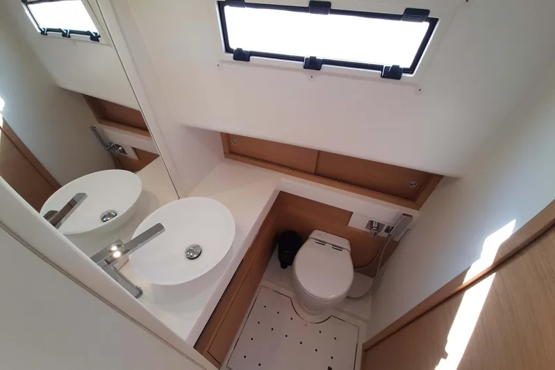 Ban Ban Yacht Photos Pics Luxurious bathroom in 2023 Pardo Yachts P50, featuring modern sink and toilet.