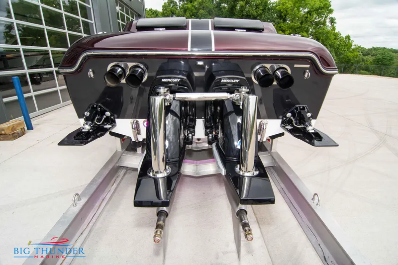  Yacht Photos Pics 2020 Donzi 38 ZRC boat rear view with dual Mercury engines on trailer.