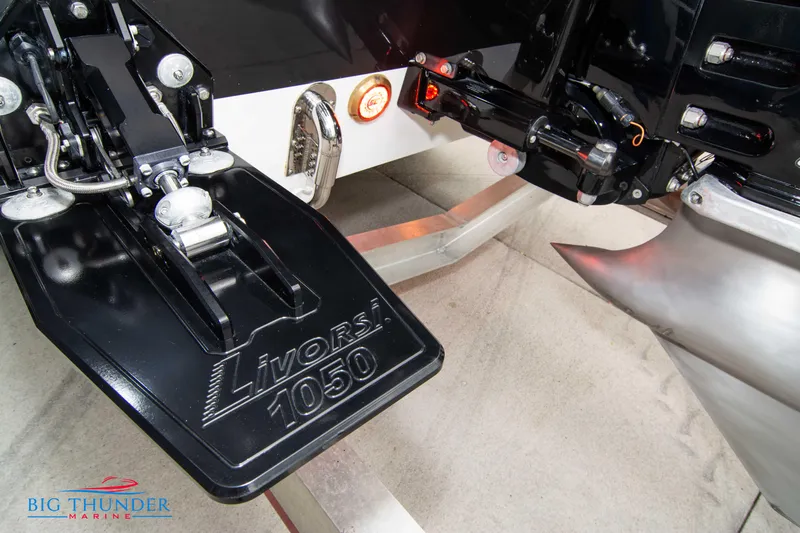  Yacht Photos Pics Close-up of 2020 Donzi 38 ZRC Livorsi 1050 trim tab and propeller.
