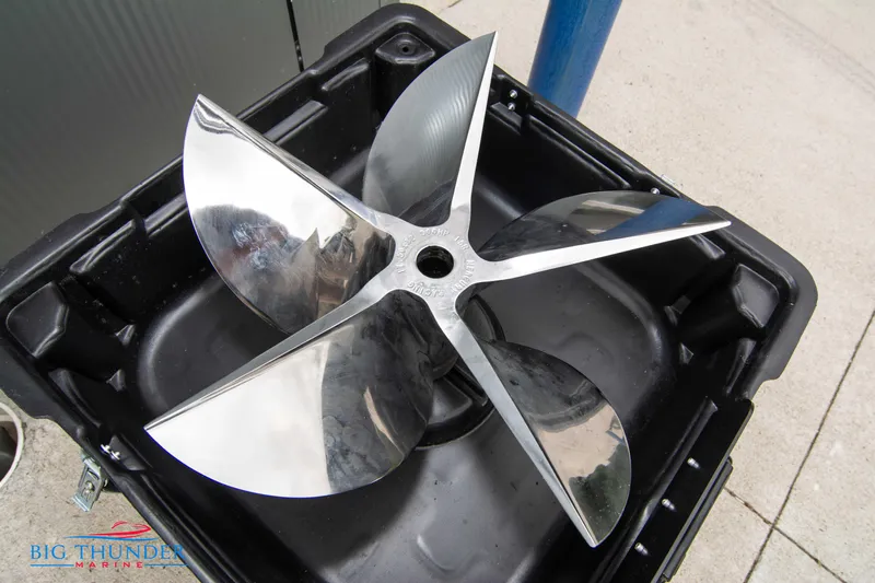  Yacht Photos Pics Shiny propeller of a 2020 Donzi 38 ZRC boat in a black container.