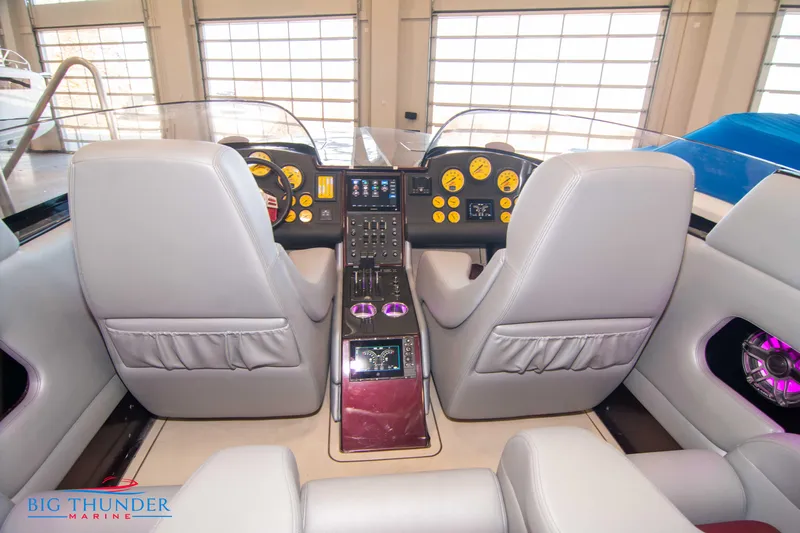  Yacht Photos Pics 2020 Donzi 38 ZRC boat cockpit with dual helm seats and control panel.