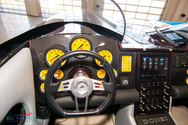  Yacht Photos Pics 2020 Donzi 38 ZRC dashboard with yellow gauges and steering wheel.