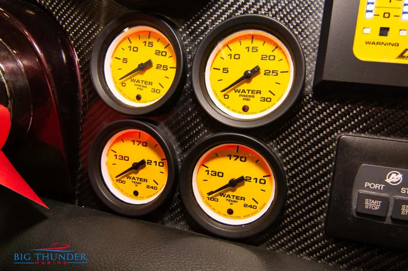  Yacht Photos Pics Close-up of 2020 Donzi 38 ZRC dashboard with yellow water pressure gauges.