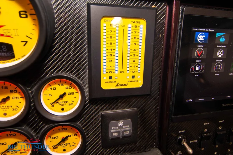  Yacht Photos Pics Dashboard of a 2020 Donzi 38 ZRC boat with gauges and control panel.